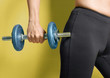 Woman holding a dumbbell