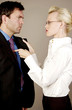 Photo: Businesswoman threatening businessman Businesswoman threatening businessman