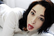 Woman sticking out her tongue