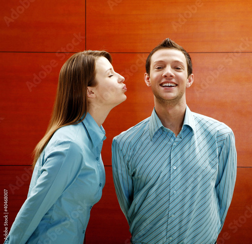 Photo: Businesswoman about to kiss businessman Businesswoman about to kiss businessman