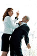 Businesswoman threatening her colleague