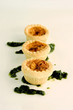 Three mini quiches in a row.