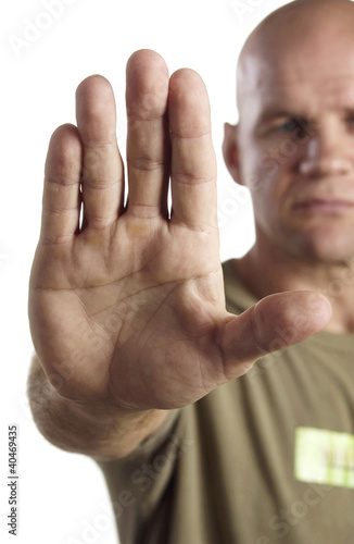 Foto: Man showing a stop gesture Man showing a stop gesture