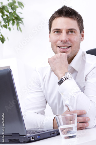 Photo: Businessman in his office Businessman in his office