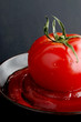 Tomato on tomato sauce.