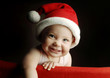 Foto: Baby in christmas hat Baby in christmas hat