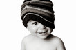 Baby in knit hat smiling