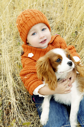 Photo: Girl posing with her dog Girl posing with her dog