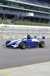 Formula one participant practicing 