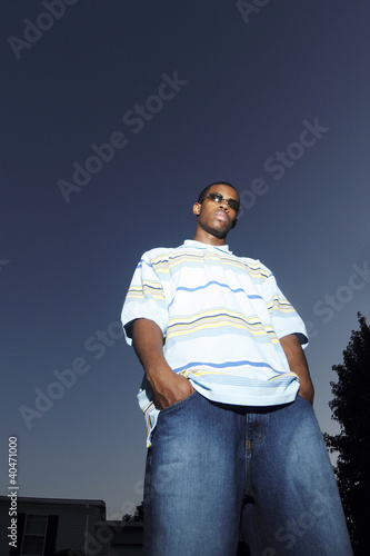 Photo: Low angle view of a hip young adult Low angle view of a hip young adult