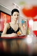 Woman enjoying her meal in a luxurious restaurant