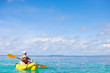Mother and son kayaking