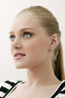 Young woman smiling while looking up