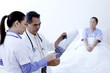 Doctors discussing about an x-ray