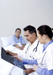 Doctors discussing about an x-ray