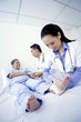 Doctors taking care of patient