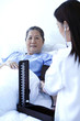 Doctor measuring blood pressure