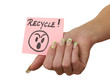 Foto: Note in Woman Hand Recycle Note in Woman Hand Recycle