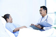 Doctor and patient in ward