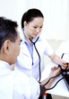 Doctor measuring blood pressure