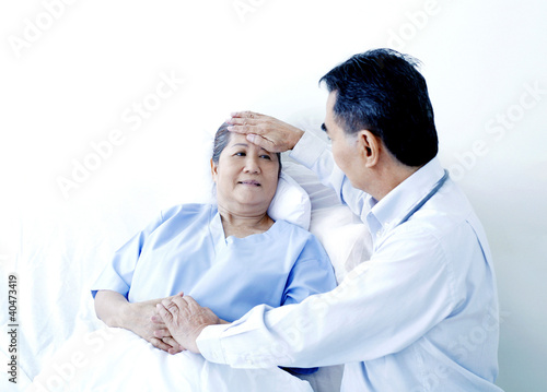 Photo: Doctor and patient in ward Doctor and patient in ward