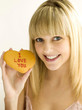 Young teen holding a cookie