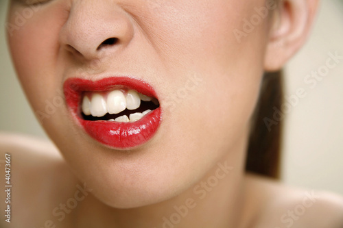 Photo: Young woman with angry look Young woman with angry look