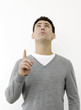 Man looking and pointing up