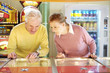 A mature couple at a store