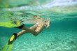 Closeup on snorkeler flippers underwater