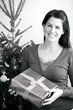 Woman holding a Christmas gift