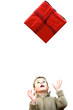 Little boy tossing his gift