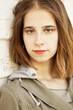 Portrait of young unhappy Woman, looking at camera