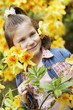 Girl with blossoms of rhododendron