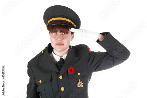 Photo: Saluting military woman. Saluting military woman.