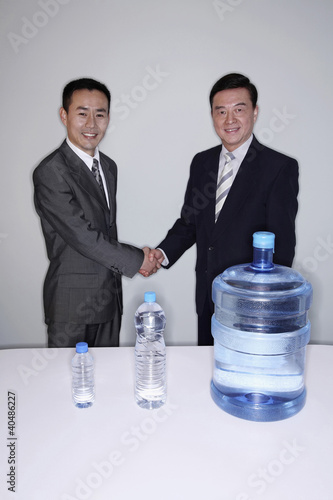 Photo: Businessmen shaking hands Businessmen shaking hands