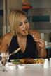 Woman eating her meal