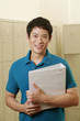 Man with a file posing for the camera