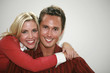 Woman embracing man
