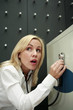Businesswoman listening to safe using stethoscope