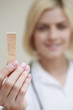 Woman holding a plaster