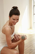 Woman lifting dumbbell
