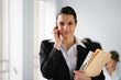 Pretty executive on the phone in office
