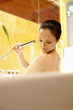 Woman washing in the bathtub