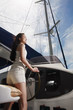 Woman steering yacht