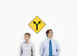 Foto: Businessman and businesswoman looking at different directions Businessman and businesswoman looking at different directions