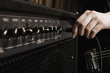 Plugging cable into amplifier