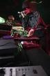 Man spinning records on turntable