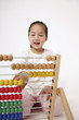 Girl using abacus