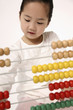 Girl using abacus